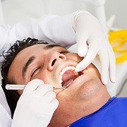 Man receiving dental exam