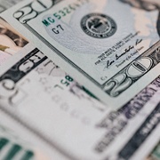 Loose cash on table for emergency dentistry