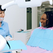 Woman in dental chair at emergency dentist