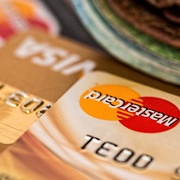 Credit cards and wallet on table