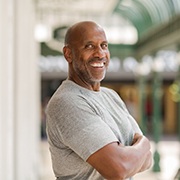 Confident man with dental implants in Oklahoma City smiles
