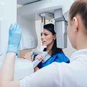 Patient using 3D cone bean CT scanner for dental implants in Oklahoma City