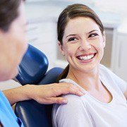 Smiling woman in dental chair