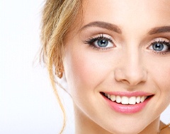 Teen girl with straight smile using Invisalign.