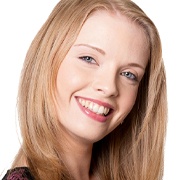 Teen with straight smile after orthodontics.
