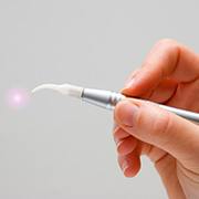 Hand holding laser tool