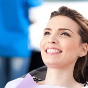 woman smiling in the dental chair
