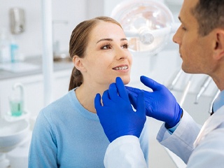 Patient getting examined in emergency dental office in Oklahoma City