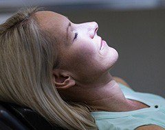 Relaxing woman in dental chair