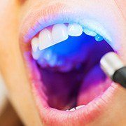 Patient examined with cavity detection tool